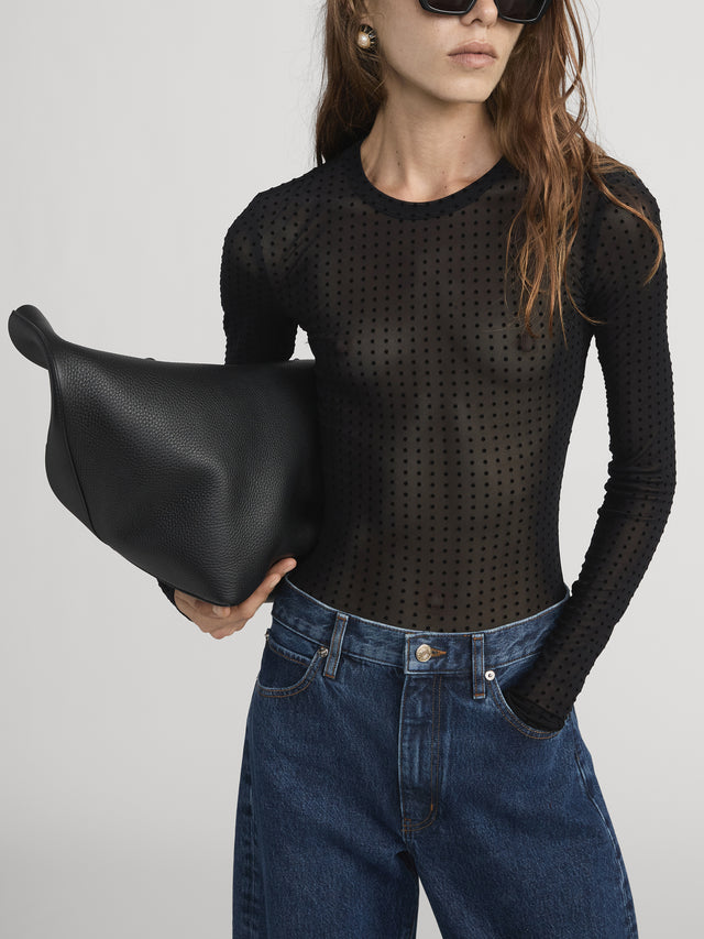 From the brand Frame Women's The Mesh Polka Dot Top in Black - abigail fashion