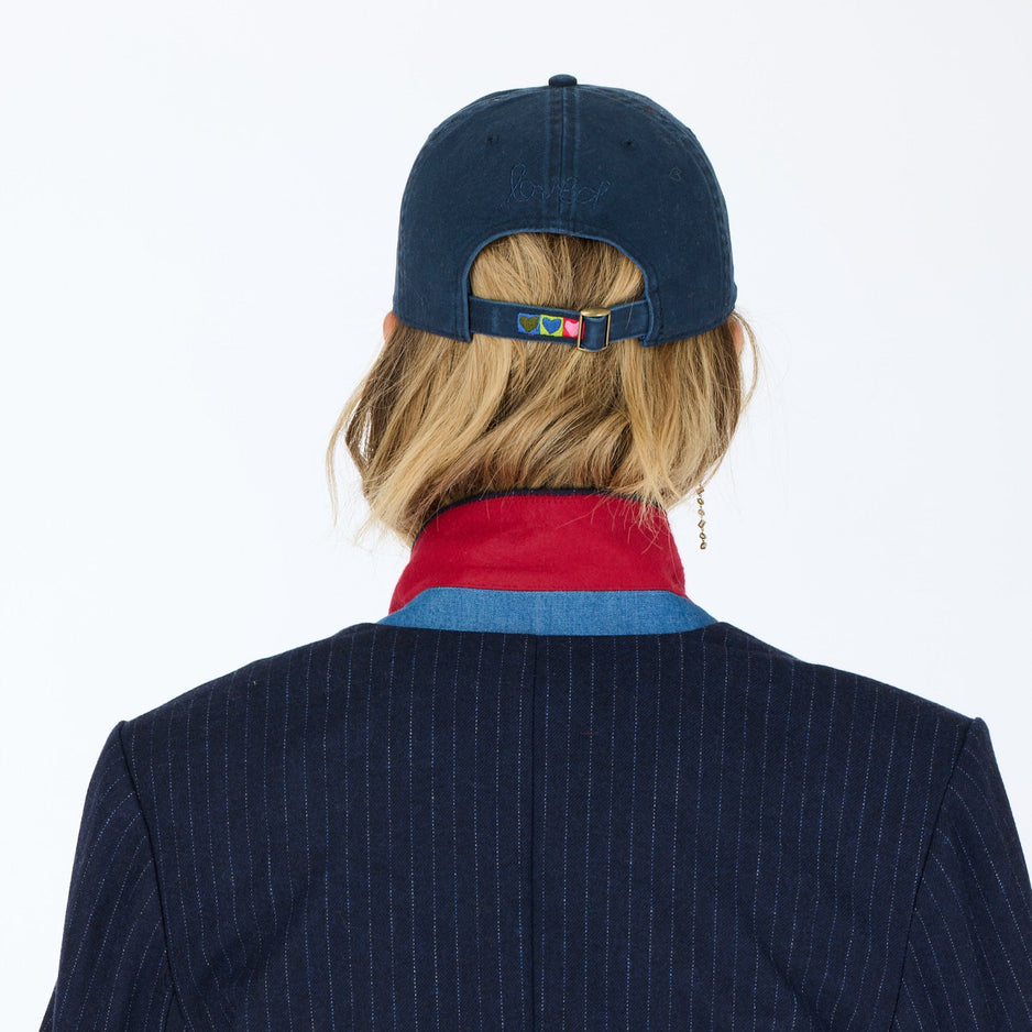 From the brand Kerri Rosenthal Women's Kr Imperfect Heart Hat in Indigo Blue - abigail fashion