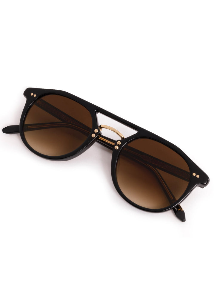 Krewe Markle Black + Black Tea 18K Sunglasses Black + Black Tea 18K abigail fashion