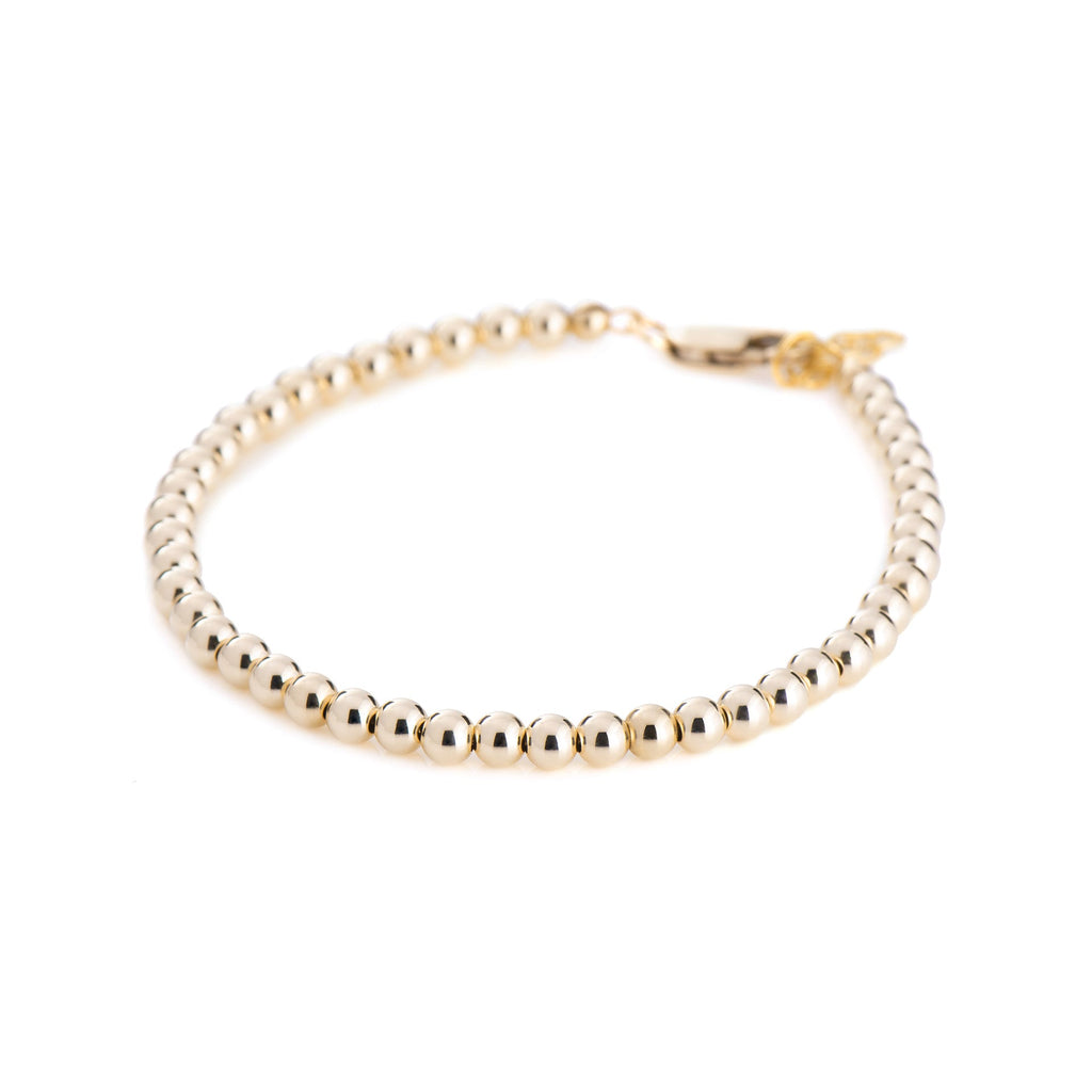 From the brand Lolo Jewellery Women's Ball Bracelets - 4MM in Gold Filled - abigail fashion