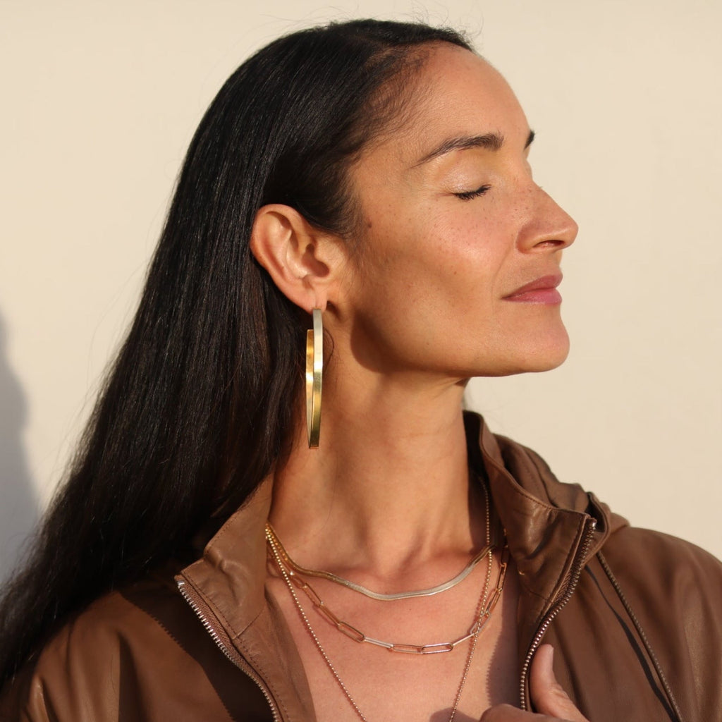 From the brand Lolo Jewellery Women's Skinny Dip Hoops Earring in Gold Vermeil - abigail fashion