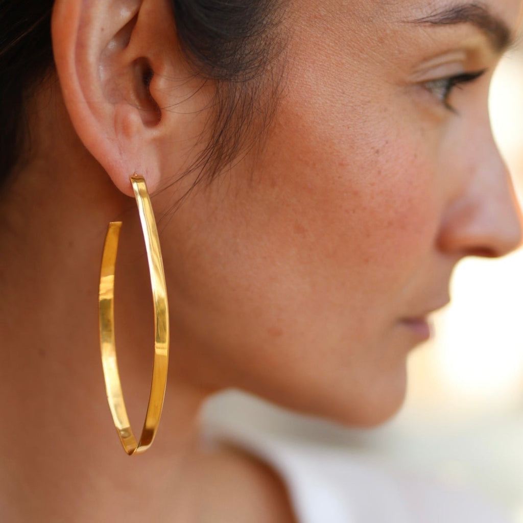 From the brand Lolo Jewellery Women's Skinny Dip Hoops Earring in Gold Vermeil - abigail fashion
