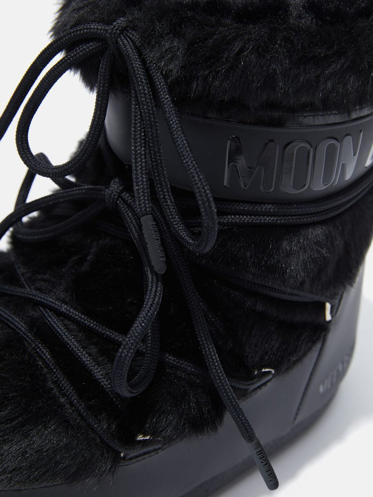 From the brand MoonBoot Women's Icon Low Faux Fur Boot in Black - abigail fashion
