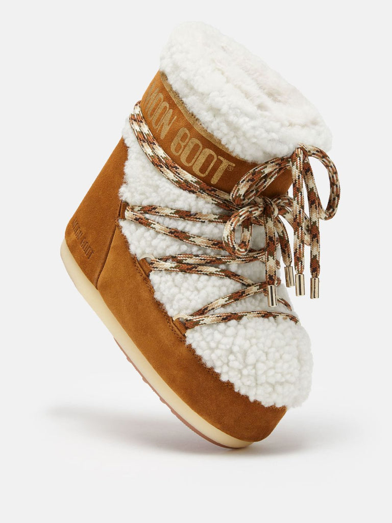 From the brand MoonBoot Women's Icon Low Shearling Boot in Whisky/Off White - abigail fashion