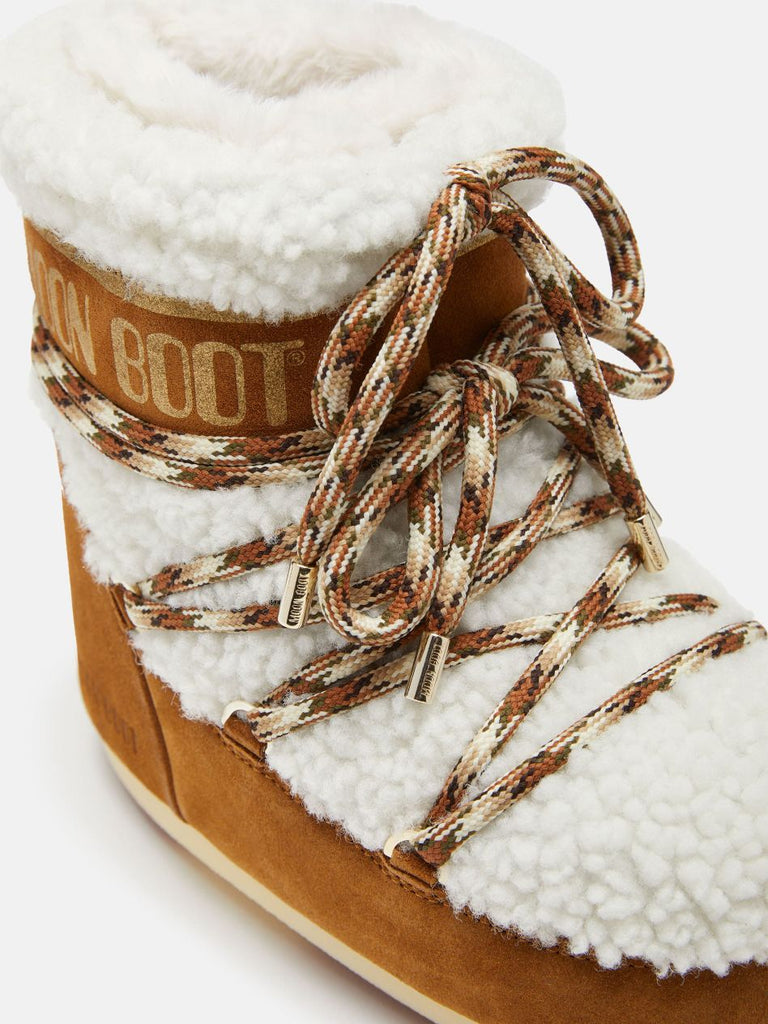 From the brand MoonBoot Women's Icon Low Shearling Boot in Whisky/Off White - abigail fashion