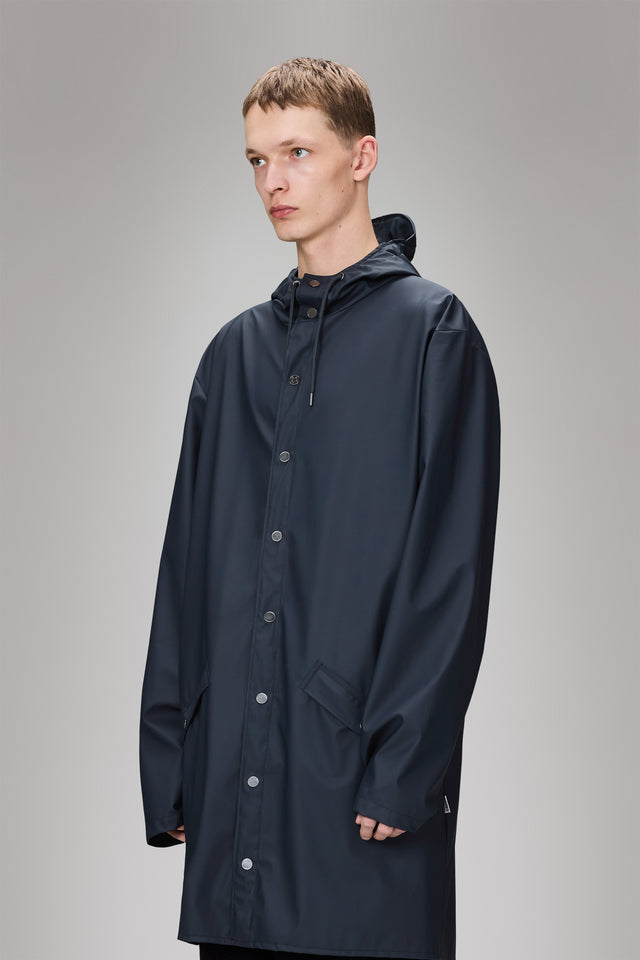 From the brand Rains Unisex Long Classic Rain Jacket W3 in Navy - abigail fashion