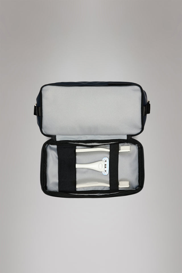 From the brand Rains Unisex Otaru Wash Bag W3 in Black - abigail fashion