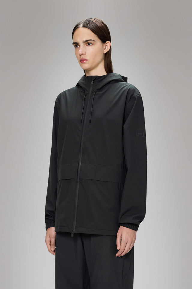 From the brand Rains Women's Suva Hardshell Pocket Jacket W3 in Black - abigail fashion