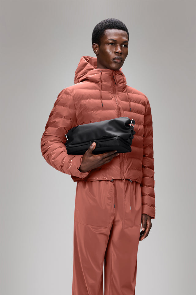 From the brand Rains Unisex Otaru Wash Bag W3 in Black - abigail fashion