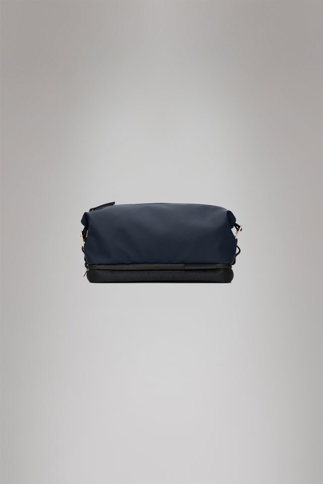 From the brand Rains Unisex Otaru Wash Bag W3 in Navy - abigail fashion