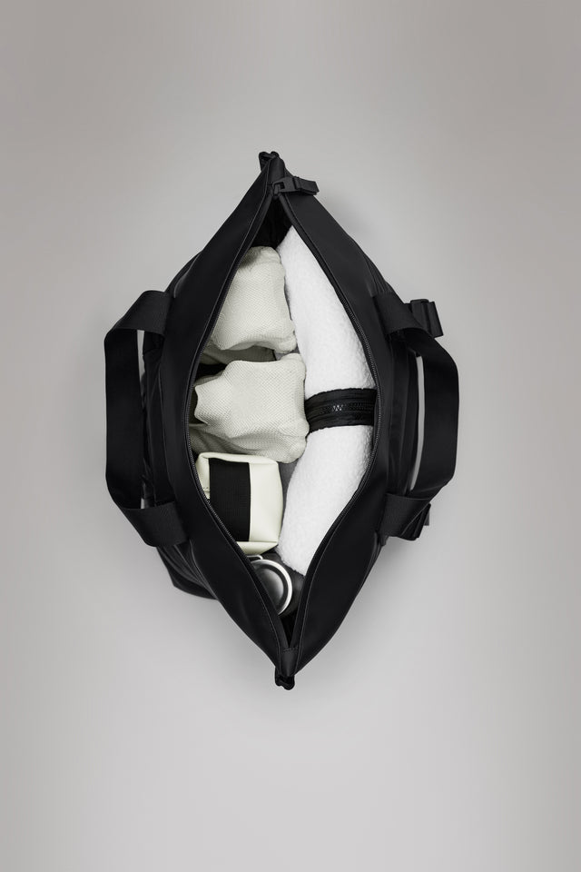 From the brand Rains Unisex Puffer Mix Tote Bag Mini W3 in Black - abigail fashion