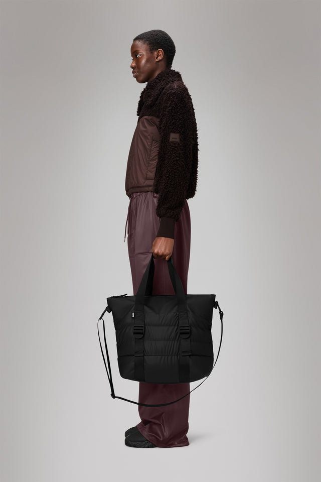From the brand Rains Unisex Puffer Mix Tote Bag Mini W3 in Black - abigail fashion
