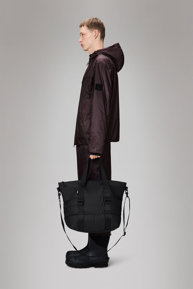 From the brand Rains Unisex Puffer Mix Tote Bag Mini W3 in Black - abigail fashion