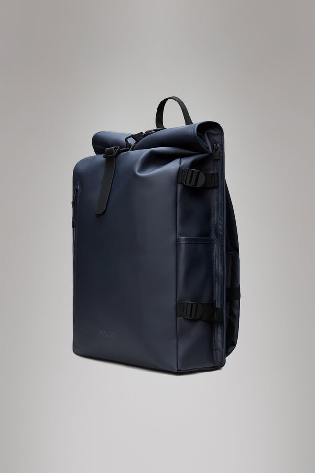 From the brand Rains Unisex Rolltop Rucksack Large W3 in Navy - abigail fashion