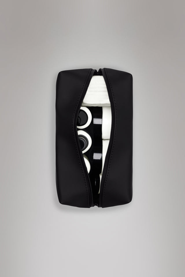 From the brand Rains Unisex Wash Bag Small W3 in Black - abigail fashion