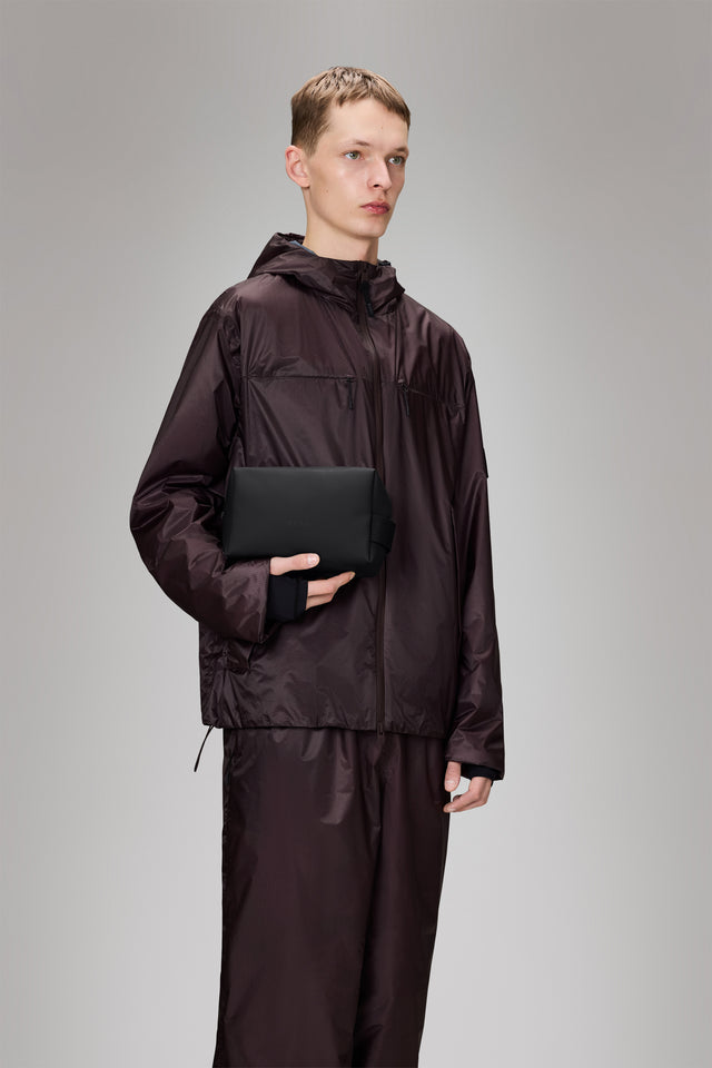 From the brand Rains Unisex Wash Bag Small W3 in Black - abigail fashion