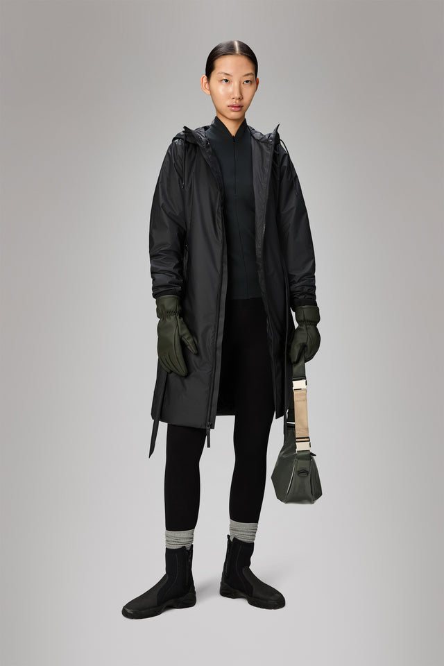 From the brand Rains Women's Lohja Long Insulated Curve Jacket W3T2 in Black - abigail fashion