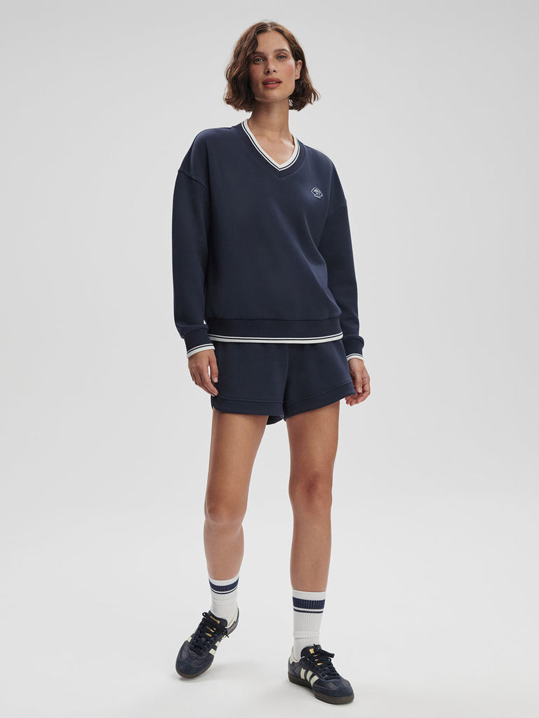 From the brand Varley Women's Iona V Neck Sweatshirt in Navy - abigail fashion
