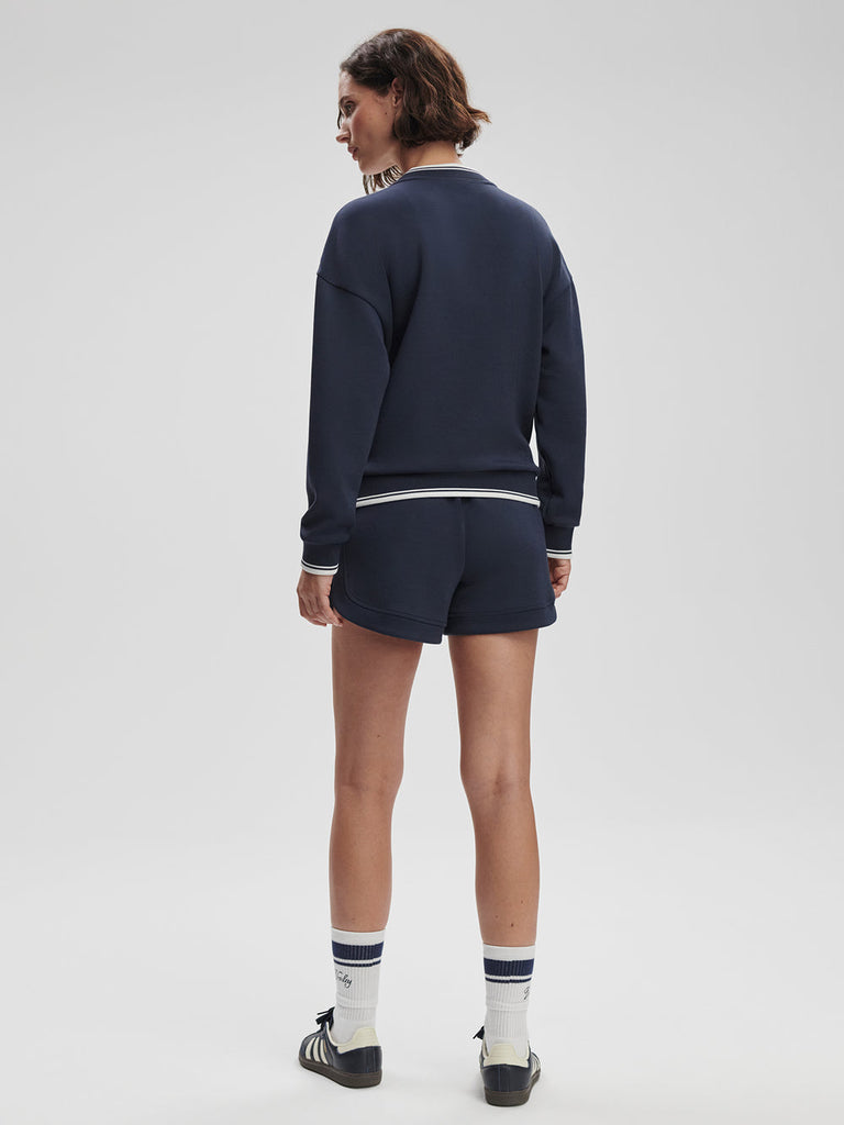 From the brand Varley Women's Iona V Neck Sweatshirt in Navy - abigail fashion