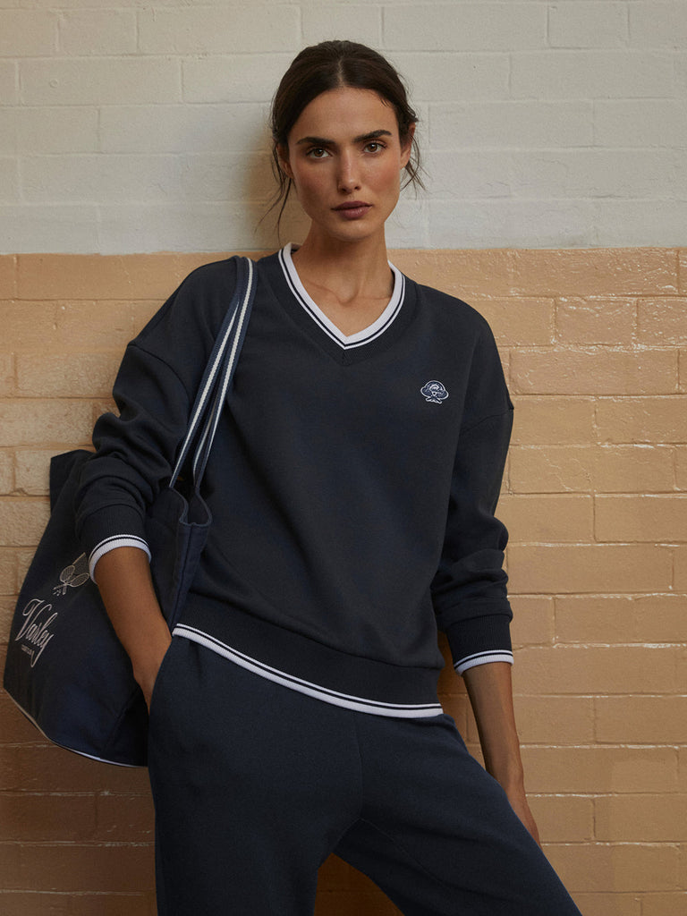 From the brand Varley Women's Iona V Neck Sweatshirt in Navy - abigail fashion