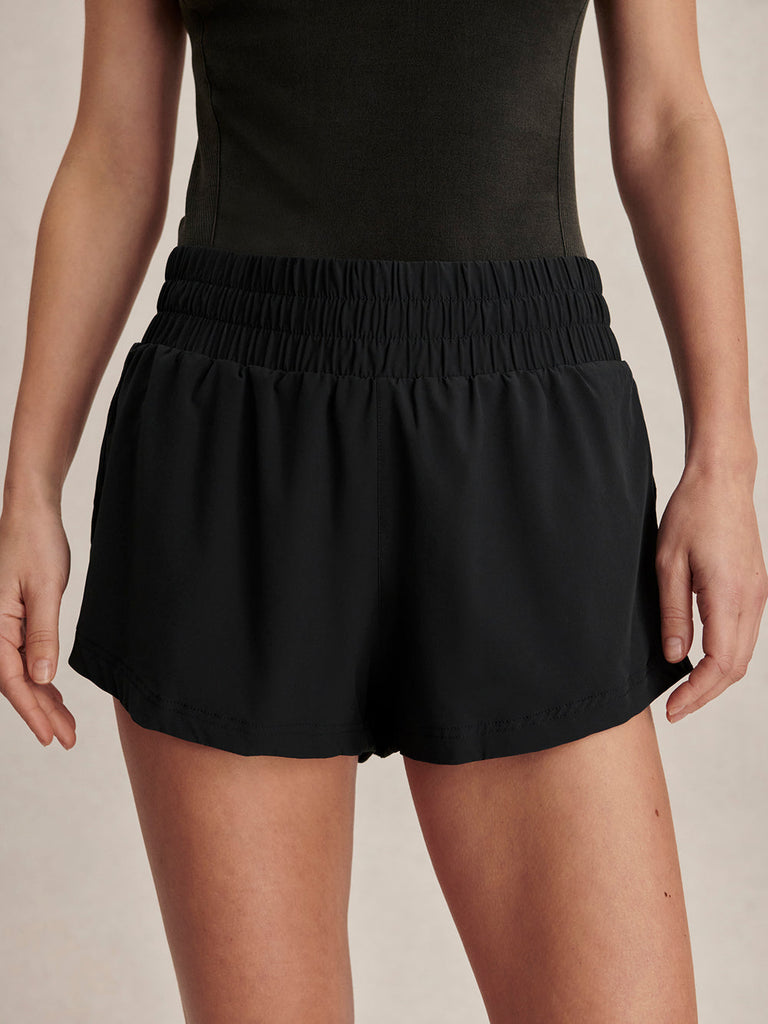 From the brand Varley Women's Kallin Running Short 1.5 in Black - abigail fashion
