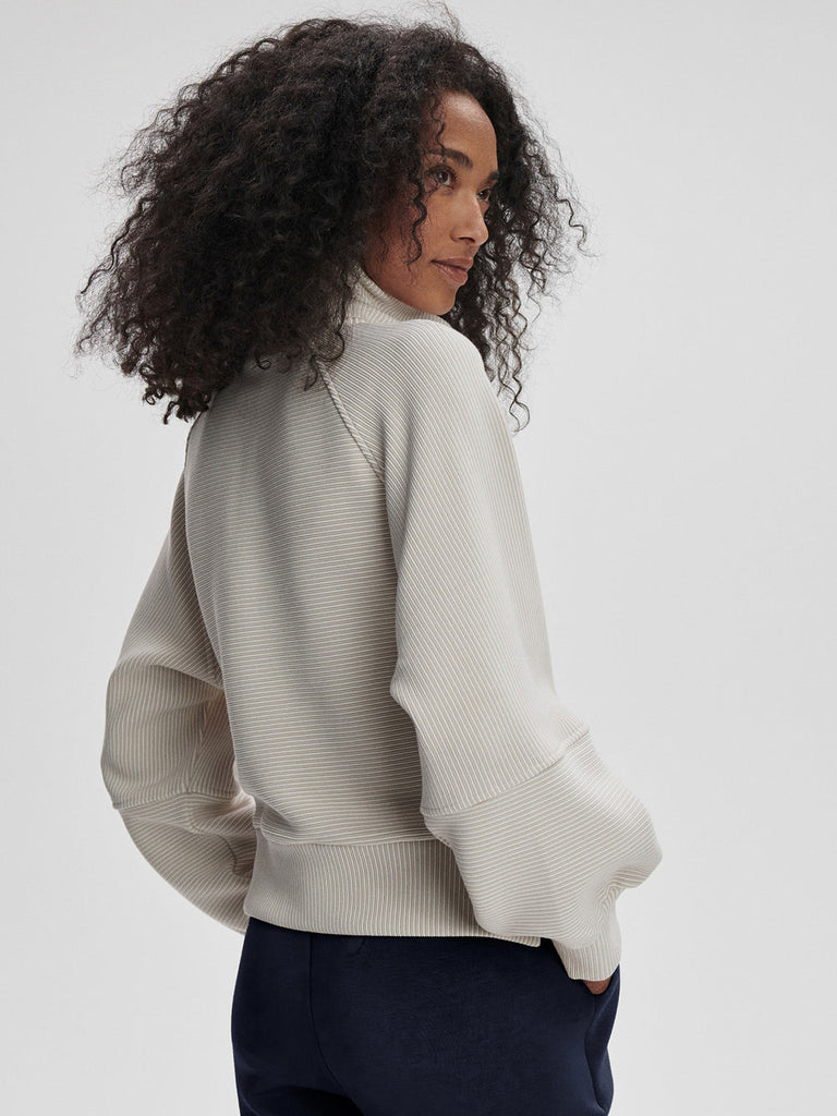 From the brand Varley Women's Milano Half Zip Sweatshirt 2.0 in Silver Grey/Snow White - abigail fashion